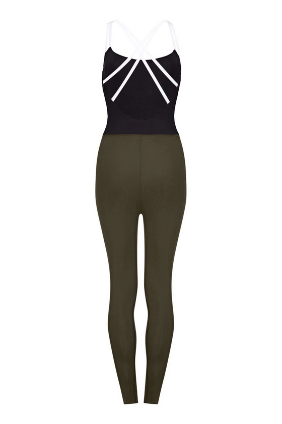 A body suit with green legs, black top and white straps