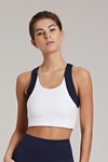 Front view of a woman wearing a white crop top