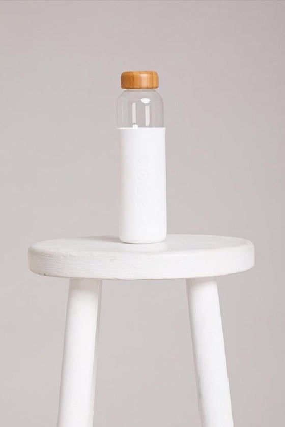 SILOU Water Bottle on a white stool