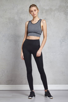  Full body length front view of a woman wearing Kate Legging - Black and a dark heather crop top