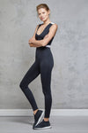 Full body length view of a woman wearing Phoebe Bodysuit - Black