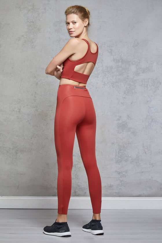 Full body length back view of a woman wearing Emma Crop - Chilli and matching leggings